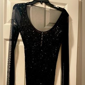 Calvin Klein Sequined Holiday Black beaded blouse with sheer sleeves and back.